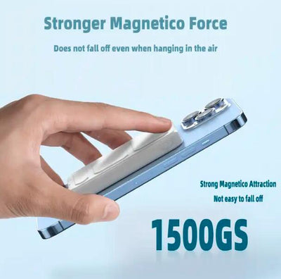 Hand holding custom logo magnetic power bank attached to smartphone with strong magnetico force