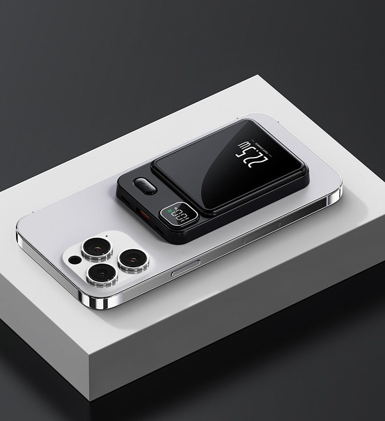 Eprolo magnetic power bank for smartphones attached to the back of a silver smartphone on a white platform