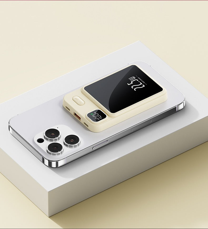 eprolo magnetic power bank for smartphones attached to silver smartphone charging on minimalist surface